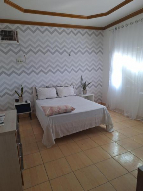 Quarto triplo com banheiro em Pousada e Restaurante